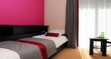 Фото номера Двухместный номер с 2 отдельными кроватями Отель Hotel Klaudia г. Juszczyn 7
